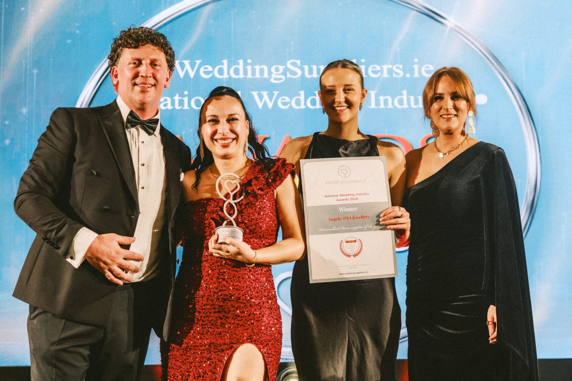 Georgiana Chitas on stage receiving the Personalised Items Supplier of the Year 2026 award.